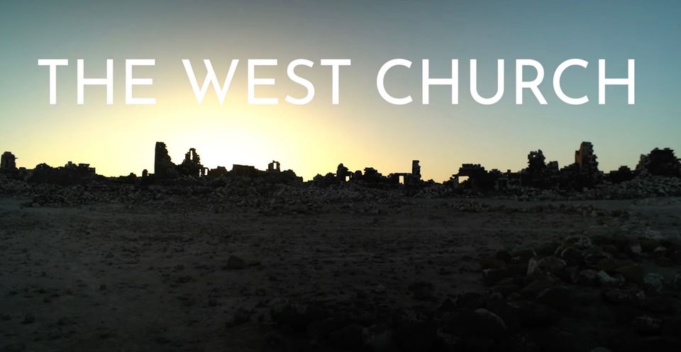 Photograph of sunrise over Umm al-Jimal, Jordan, with "The West Church" film title
